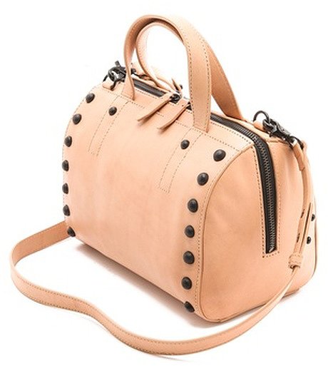 I always love Loeffler Randall's take on what's in style, and this new Small Duffel Bag ($395) gives me that top handle look for Fall with the crossbody strap I love. Plus, the studs make the bag so much more than a simple work bag without being overly fussy. Cute bag that's big enough for me to wear to work every day? Now that's a must have.
— Melissa Liebling-Goldberg, fashion and beauty director
I always love Loeffler Randall's take on what's in style, and this new Small Duffel Bag ($395) gives me that top handle look for Fall with the crossbody strap I love. Plus, the studs make the bag so much more than a simple work bag without being overly fussy. Cute bag that's big enough for me to wear to work every day? Now that's a must have.
— Melissa Liebling-Goldberg, fashion and beauty director