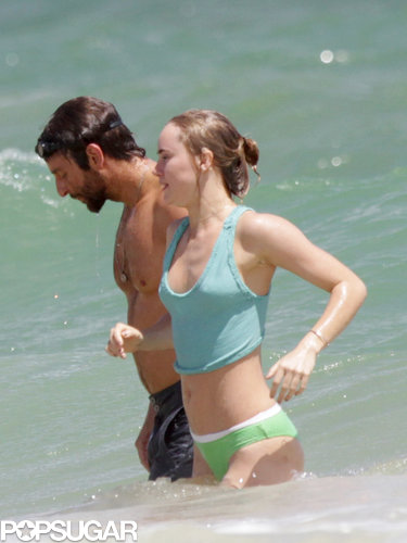 Bradley Cooper and Suki Waterhouse hit the beach during their Hawaii vacation.
Bradley Cooper and Suki Waterhouse hit the beach during their Hawaii vacation.