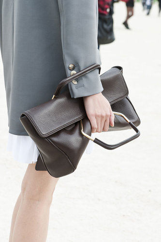 Even when it's not a clutch, the clutch is still the bag of choice at Paris Fashion Week.
Even when it's not a clutch, the clutch is still the bag of choice at Paris Fashion Week.