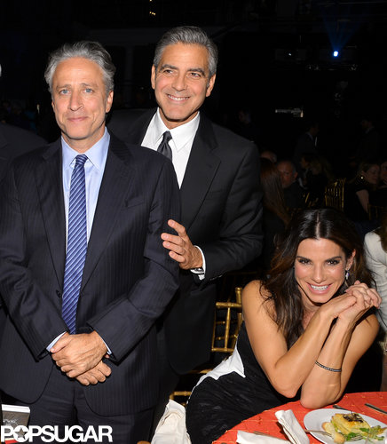 Jon Stewart chatted with George Clooney and Sandra Bullock.
Jon Stewart chatted with George Clooney and Sandra Bullock.