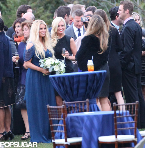 Jessica Simpson posed with wedding guests.
Jessica Simpson posed with wedding guests.