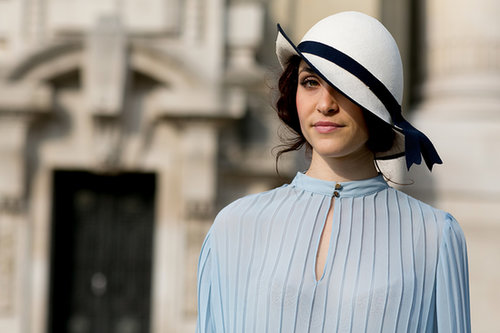 Vintage curls go perfectly with a vintage hat.
Vintage curls go perfectly with a vintage hat.