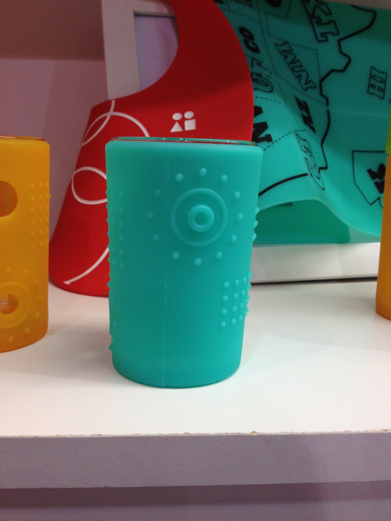 Silikids places silicone covers over drinking glasses to introduce real glasses to tots.

