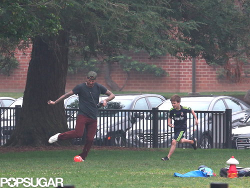 David Beckham played soccer with his son Cruz when the group went to Harper's game.
David Beckham played soccer with his son Cruz when the group went to Harper's game.