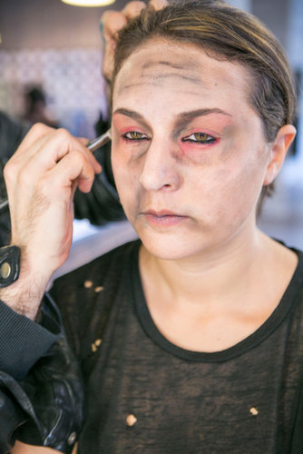 He blended the look with a brush and added more depth with black powder.
He blended the look with a brush and added more depth with black powder.
