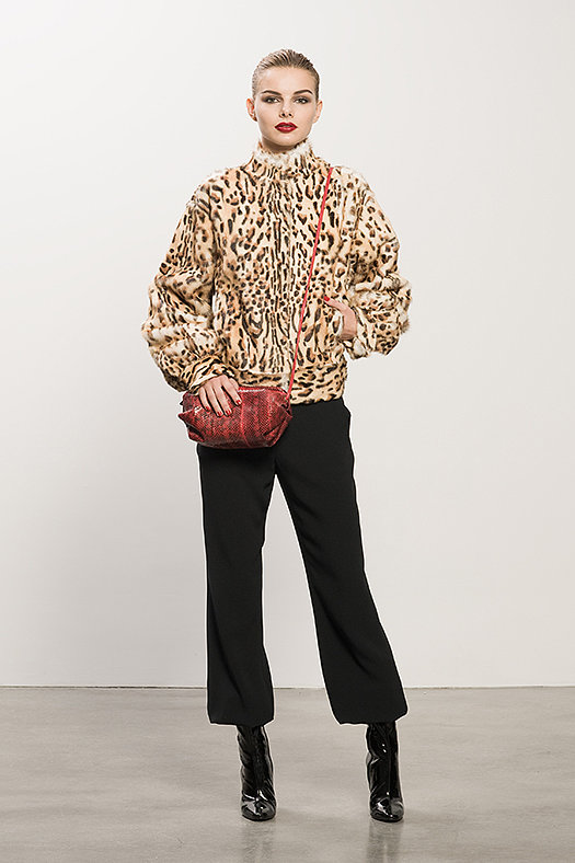 Leopard Goat Hair Bomber ($1,995), Crepe Black Elastic Bottom Pant ($595), Follow Me Black Patent Mid-Calf Boot ($995), Sunset Watersnake Red Cross Body Bag ($625)
Photo courtesy of Tamara Mellon
Leopard Goat Hair Bomber ($1,995), Crepe Black Elastic Bottom Pant ($595), Follow Me Black Patent Mid-Calf Boot ($995), Sunset Watersnake Red Cross Body Bag ($625)
Photo courtesy of Tamara Mellon
