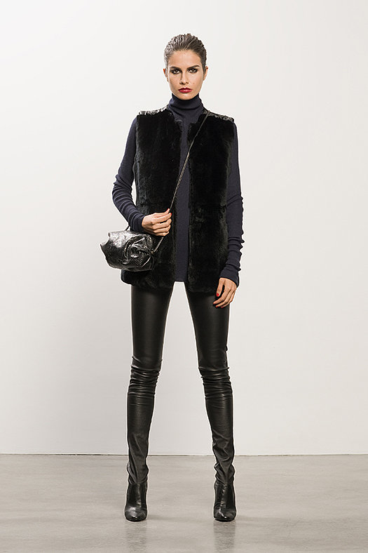 Rabbit Fur Black Vest ($995), Cashmere Navy Turtleneck Sweater ($495), Sweet Revenge Black Leather Legging Boot ($1,995), Sunset Watersnake Black Cross Body Bag ($625)
Photo courtesy of Tamara Mellon
Rabbit Fur Black Vest ($995), Cashmere Navy Turtleneck Sweater ($495), Sweet Revenge Black Leather Legging Boot ($1,995), Sunset Watersnake Black Cross Body Bag ($625)
Photo courtesy of Tamara Mellon