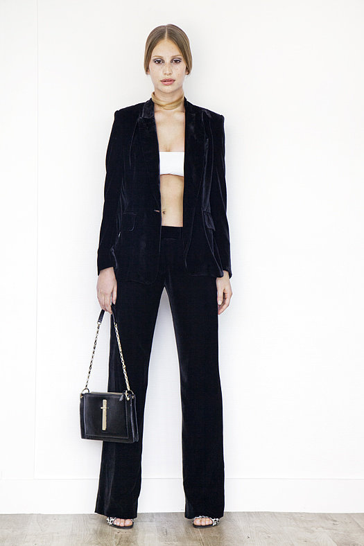 Leather Bandeau in Cream ($350), Classic Velvet Blazer Jacket in Black ($995), Classic Velvet Trouser in Black ($795), Wild Night Pony Sandal in Grey Leopard ($750), Attraction Patent Shoulder Bag in Black ($1,795)
Photo courtesy of Tamara Mellon
Leather Bandeau in Cream ($350), Classic Velvet Blazer Jacket in Black ($995), Classic Velvet Trouser in Black ($795), Wild Night Pony Sandal in Grey Leopard ($750), Attraction Patent Shoulder Bag in Black ($1,795)
Photo courtesy of Tamara Mellon