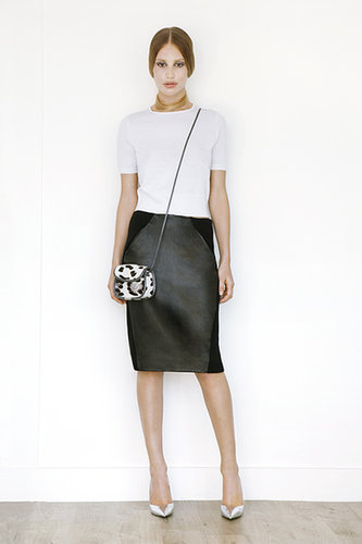 Short Sleeved Cashmere Tee in Cream ($295), Leather Slim Skirt in Black ($1,195), Treasure Cross Body Pony Bag in Cream Leopard ($795), Addiction Pump in Specchio ($595)
Photo courtesy of Tamara Mellon
Short Sleeved Cashmere Tee in Cream ($295), Leather Slim Skirt in Black ($1,195), Treasure Cross Body Pony Bag in Cream Leopard ($795), Addiction Pump in Specchio ($595)
Photo courtesy of Tamara Mellon