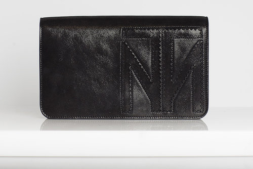 TM Enjoy Calf Clutch in Black ($595)
Photo courtesy of Tamara Mellon
TM Enjoy Calf Clutch in Black ($595)
Photo courtesy of Tamara Mellon