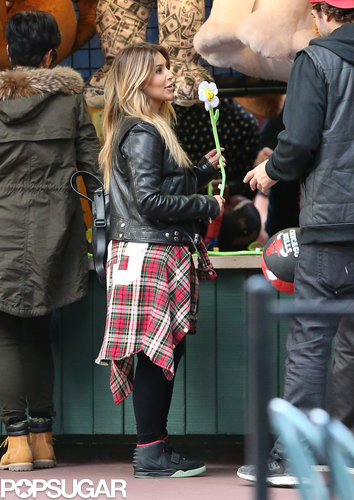 Kim Kardashian played a few carnival games at the theme park.
Kim Kardashian played a few carnival games at the theme park.