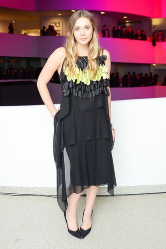 Elizabeth Olsen was decked out in Dior Haute Couture at the preparty for the Guggenheim International Gala. She accessorized her cocktail dress with a pair of heels and a diamond bracelet, also by the brand.
Elizabeth Olsen was decked out in Dior Haute Couture at the preparty for the Guggenheim International Gala. She accessorized her cocktail dress with a pair of heels and a diamond bracelet, also by the brand.