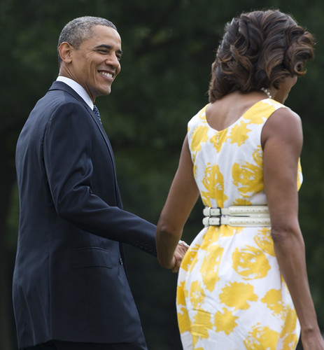 President Obama looked happy to head out for vacation.
President Obama looked happy to head out for vacation.