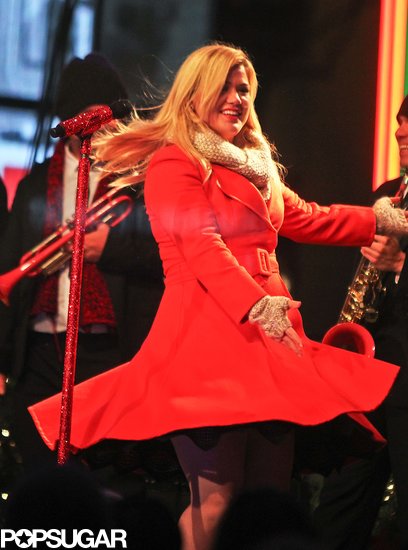 Kelly Clarkson was truly "Wrapped in Red" with a festive red coat during her Rockefeller Center tree lighting taping.
Kelly Clarkson was truly "Wrapped in Red" with a festive red coat during her Rockefeller Center tree lighting taping.