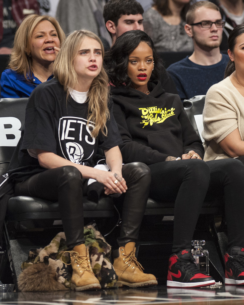 Cara Delevingne was quite the sport in Nets gear when she joined good pal Rihanna's cheering section at a recent game.
Cara Delevingne was quite the sport in Nets gear when she joined good pal Rihanna's cheering section at a recent game.