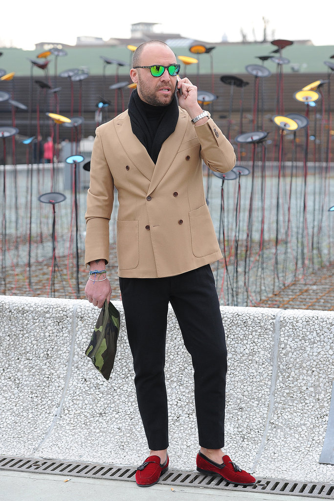 We can't decide what we love more: the jacket, the shades, the clutch, or those shoes — this guy nailed it.
We can't decide what we love more: the jacket, the shades, the clutch, or those shoes — this guy nailed it.