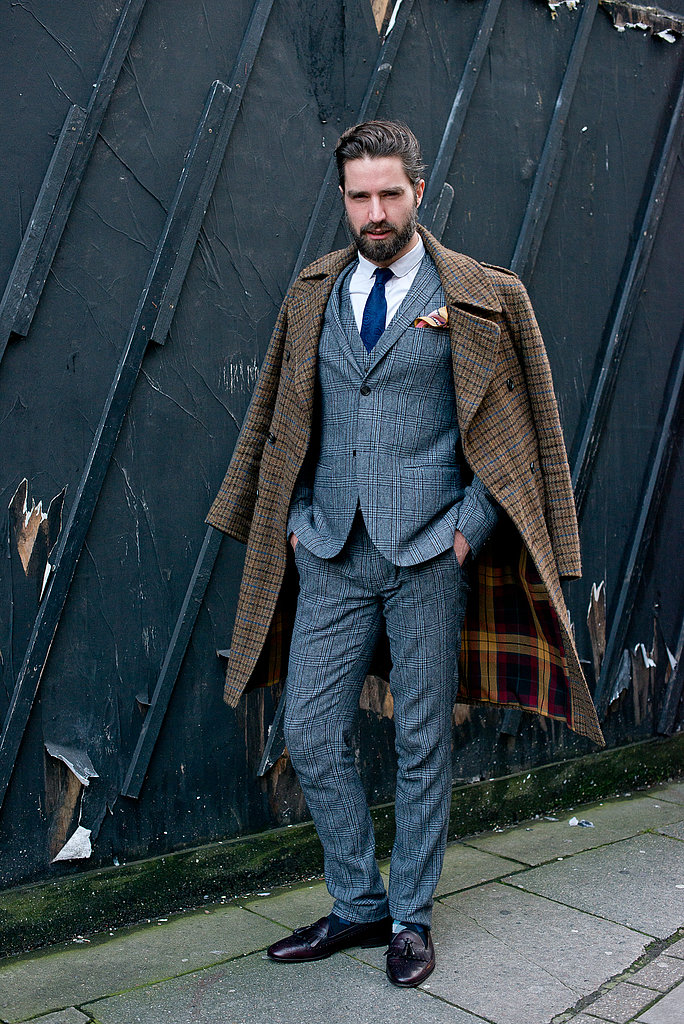 dapper suit and layered overcoat Mens fashion week street style, Mens