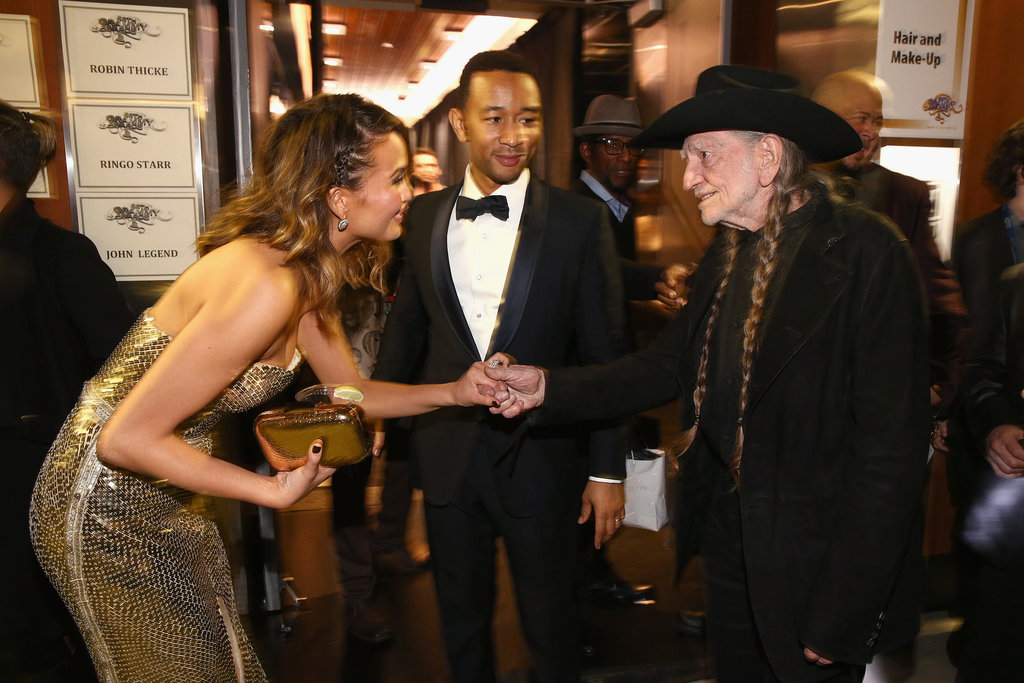 Chrissy Teigen shook Willie Nelson's hand. Chrissy Teigen shook Willie Nelson's hand.