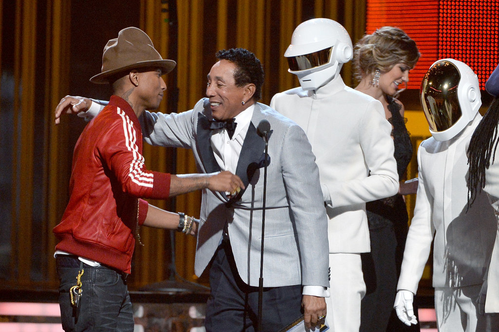 Smokey Robinson hugged Pharrell Williams as he and Daft Punk won.
Smokey Robinson hugged Pharrell Williams as he and Daft Punk won.