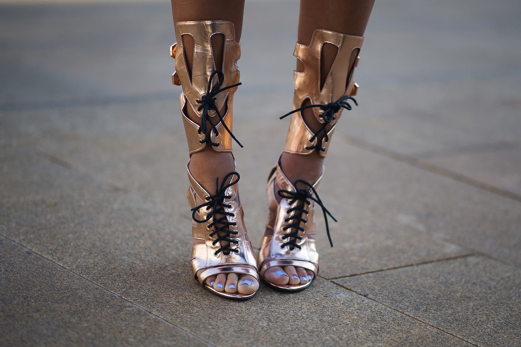 Aimee Song laced up a pair of Rebecca Minkoff's gladiator sandals.
Aimee Song laced up a pair of Rebecca Minkoff's gladiator sandals.