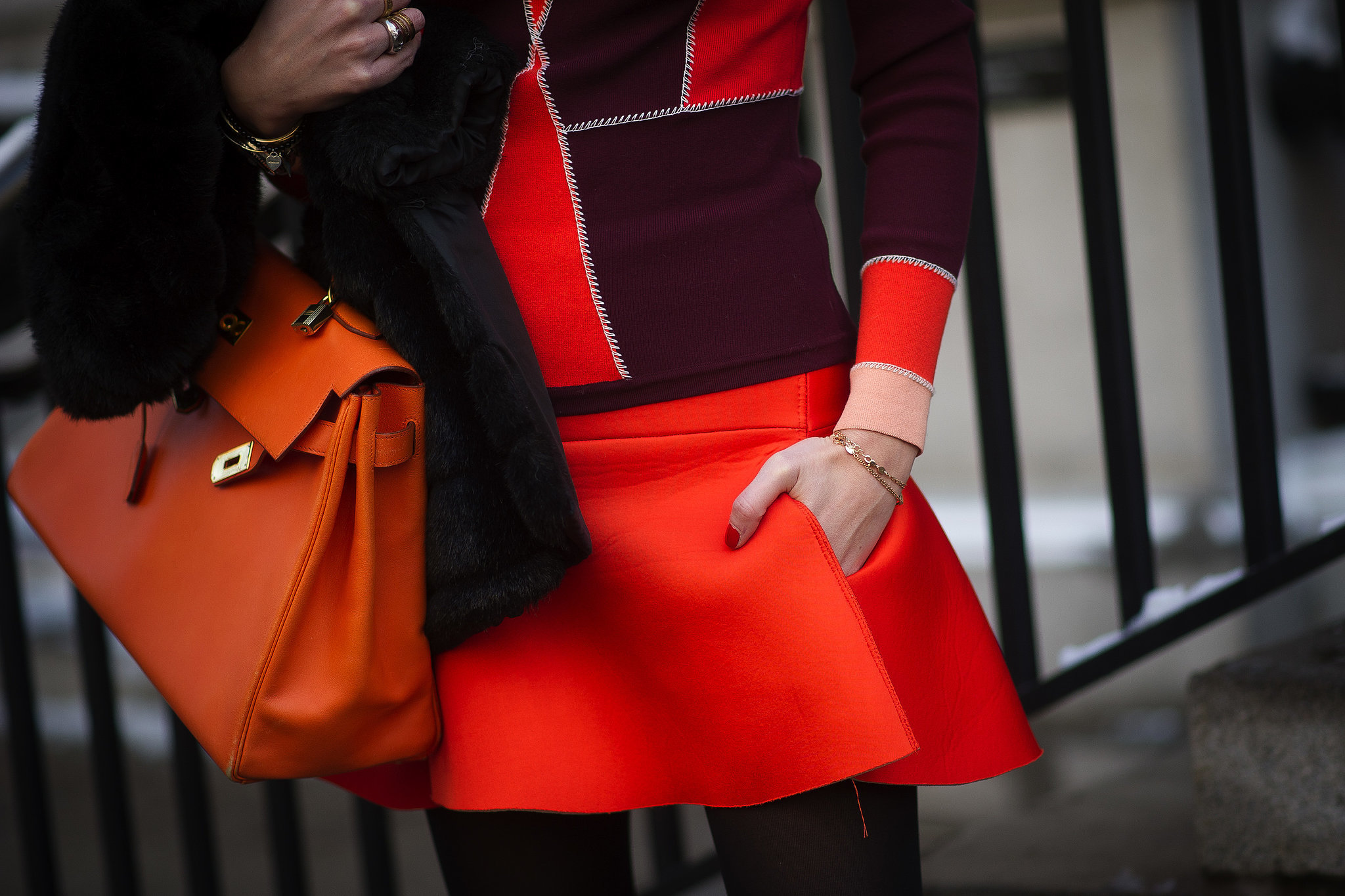 Chiara Ferragni toted a bag to match the bright shades of her outfit. 
