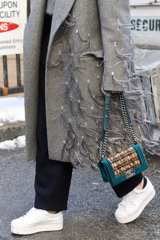 The shoes might be more laid-back, but she didn't hold back on the coat or handbag.
The shoes might be more laid-back, but she didn't hold back on the coat or handbag.