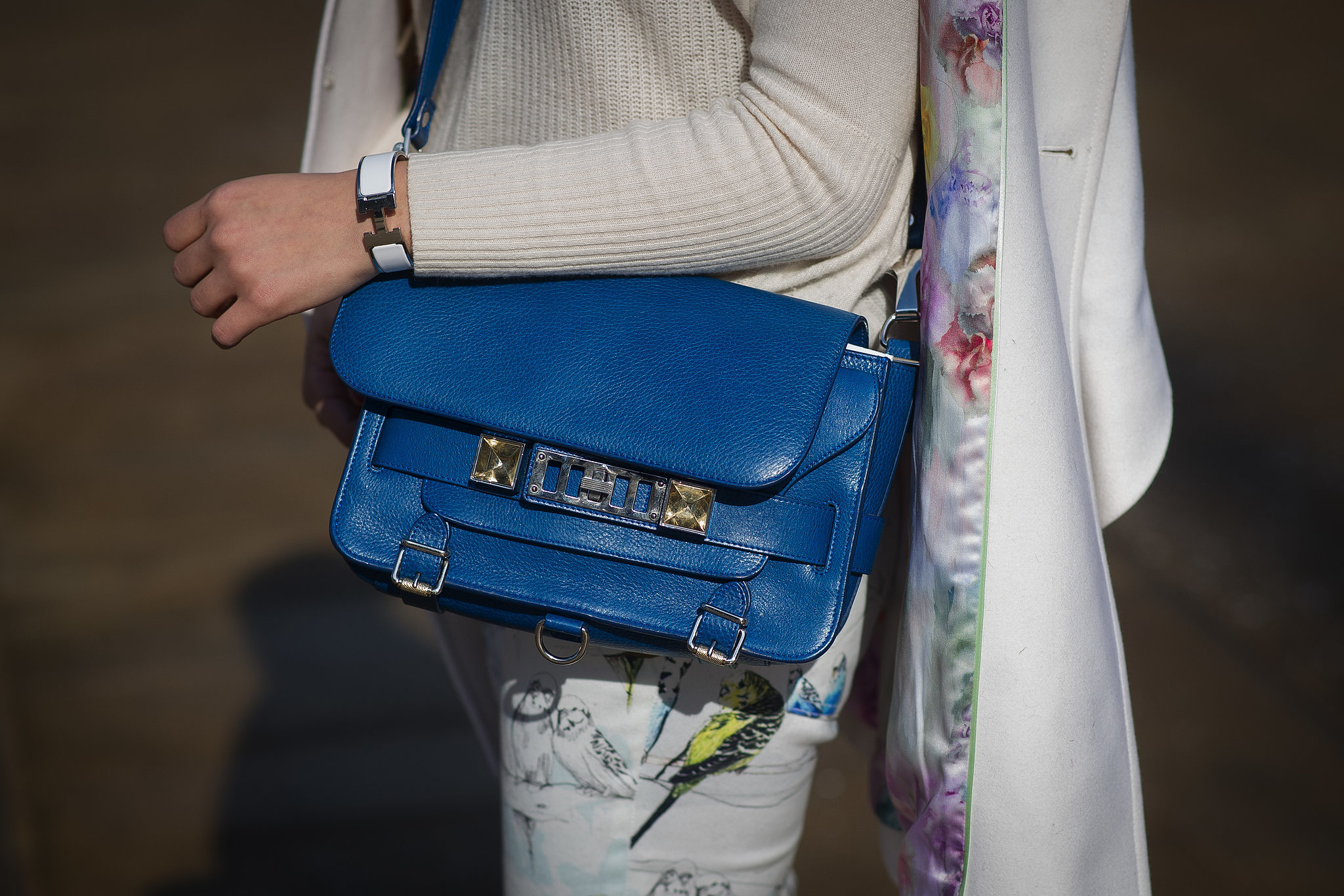 A pretty blue Proenza bag and floral denim hinted at Spring. 
