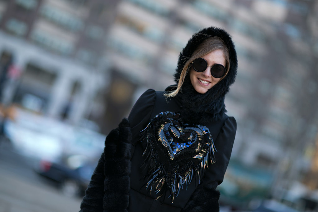 Chiara Ferragni accessorized with black shades and a cozy hood.
Chiara Ferragni accessorized with black shades and a cozy hood.
