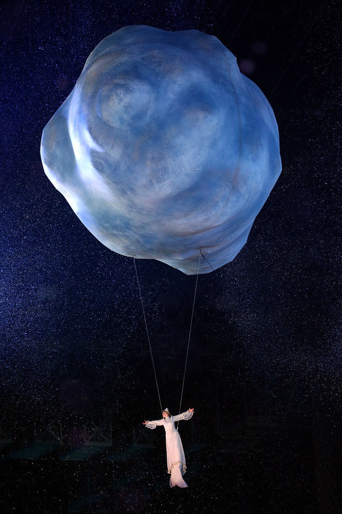 Artists floated beneath the clouds.
