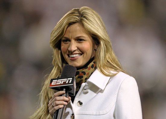In 2004, she started working for ESPN as a reporter for National Hockey Night. Soon, she took on sideline reporting duties for both college football and major league baseball. By 2007, she was named "America's Sexiest Sportscaster" by Playboy Magazine.
She had already made a name for herself in the sports world, when a peeping Tom scandal thrust her into the national spotlight in 2009. Footage of Erin naked in a hotel room was released online, and the stalker was later arrested and sentenced to 30 months in prison. Erin told Oprah that she thought her career was over because of the scandal but added, "I also feel it's my duty to come out and show this person, you know what? I worked hard for my career and I — I got there the right way, and you're not gonna break me down."
In 2004, she started working for ESPN as a reporter for National Hockey Night. Soon, she took on sideline reporting duties for both college football and major league baseball. By 2007, she was named "America's Sexiest Sportscaster" by Playboy Magazine.
She had already made a name for herself in the sports world, when a peeping Tom scandal thrust her into the national spotlight in 2009. Footage of Erin naked in a hotel room was released online, and the stalker was later arrested and sentenced to 30 months in prison. Erin told Oprah that she thought her career was over because of the scandal but added, "I also feel it's my duty to come out and show this person, you know what? I worked hard for my career and I — I got there the right way, and you're not gonna break me down."