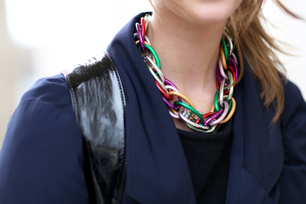 An artsy rainbow-colored chain-link necklace lit up a navy and black ensemble.
An artsy rainbow-colored chain-link necklace lit up a navy and black ensemble.