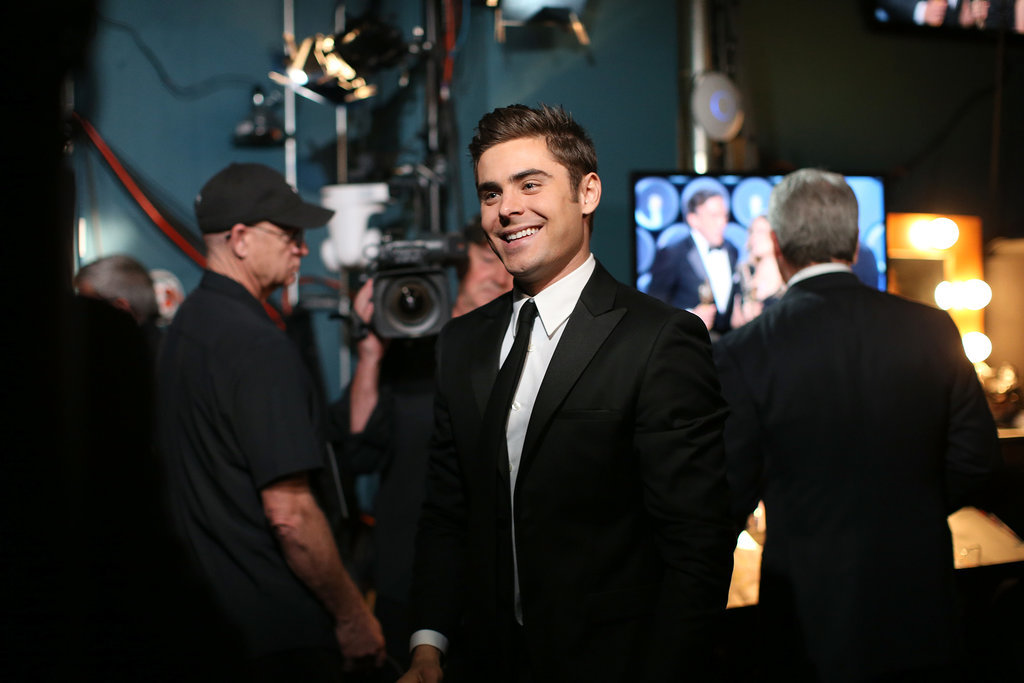 Zac Efron Brings His Suit and Smirk to the Oscars Zac Efron Brings His Suit and Smirk to the Oscars