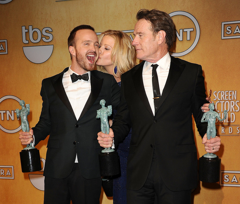 Breaking Bad costars Aaron Paul, Anna Gunn, and Bryan Cranston got kissy after winning their SAG Award.
Breaking Bad costars Aaron Paul, Anna Gunn, and Bryan Cranston got kissy after winning their SAG Award.