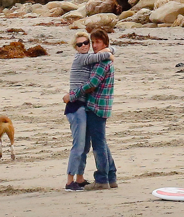 Charlize and Sean Can't Keep Their Hands Off Each Other Charlize and Sean Can't Keep Their Hands Off Each Other