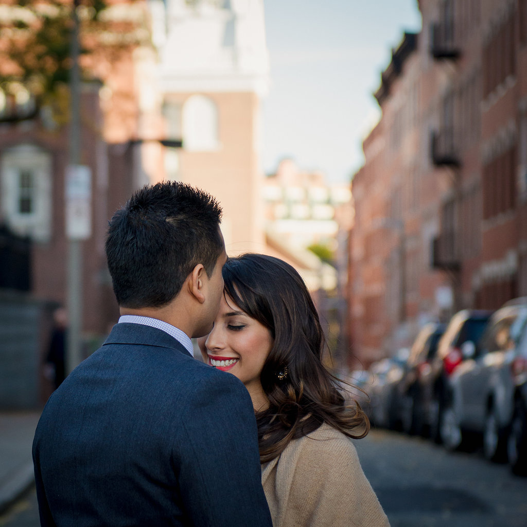 Describe the engagement shoot theme. How did the day go? What was your favorite part?
"Our engagement shoot was amazing! We chose to have our shoot in mid October to capture the essence of Fall — the leaves were just in the process of changing colors — while at the same time there was still plenty of greenery around everywhere. The main theme that we were going for was simple. We just wanted to be captured in our element, with us being us. We wanted pictures of us hanging out with our dog in our Boston neighborhood since it had so much significance for us.
I had also done some research online a few days prior to our shoot to get some ideas of different poses or backgrounds that I really wanted. I ended up sharing some of these inspirational pictures with Christian. On the day of shoot, we lucked out with the weather; it ended up being sunny, warm, and beautiful. We were relaxed and just went with the flow. We had such a blast with our photographer."
Photo by Christian Pleva
Describe the engagement shoot theme. How did the day go? What was your favorite part?
"Our engagement shoot was amazing! We chose to have our shoot in mid October to capture the essence of Fall — the leaves were just in the process of changing colors — while at the same time there was still plenty of greenery around everywhere. The main theme that we were going for was simple. We just wanted to be captured in our element, with us being us. We wanted pictures of us hanging out with our dog in our Boston neighborhood since it had so much significance for us.
I had also done some research online a few days prior to our shoot to get some ideas of different poses or backgrounds that I really wanted. I ended up sharing some of these inspirational pictures with Christian. On the day of shoot, we lucked out with the weather; it ended up being sunny, warm, and beautiful. We were relaxed and just went with the flow. We had such a blast with our photographer."
Photo by Christian Pleva