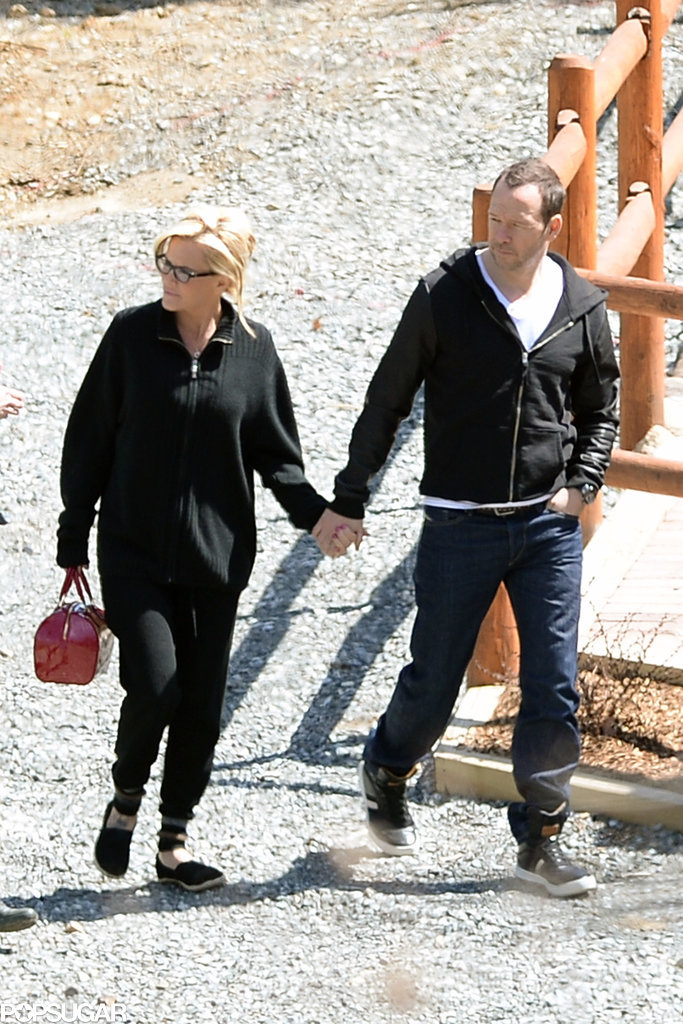 Jenny McCarthy Puts Her Blinged-Out Hand in Donnie Wahlberg's Jenny McCarthy Puts Her Blinged-Out Hand in Donnie Wahlberg's