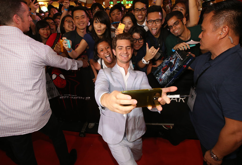 Andrew Garfield snapped a big group selfie at a fan event in Singapore in March 2014.
Andrew Garfield snapped a big group selfie at a fan event in Singapore in March 2014.