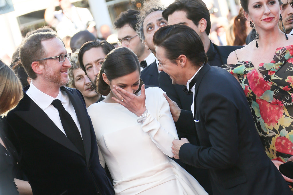 Marion Cotillard got emotional during the 2013 red carpet premiere of The Immigrant; her costar, Jeremy Renner, helped her compose herself.
Marion Cotillard got emotional during the 2013 red carpet premiere of The Immigrant; her costar, Jeremy Renner, helped her compose herself.