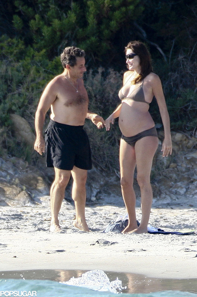 Carla Bruni wasn't shy about baring her bump in a tiny bikini with her husband, then-French President Nicolas Sarkozy, in the French resort town of Fort de Brégancon.
Carla Bruni wasn't shy about baring her bump in a tiny bikini with her husband, then-French President Nicolas Sarkozy, in the French resort town of Fort de Brégancon.