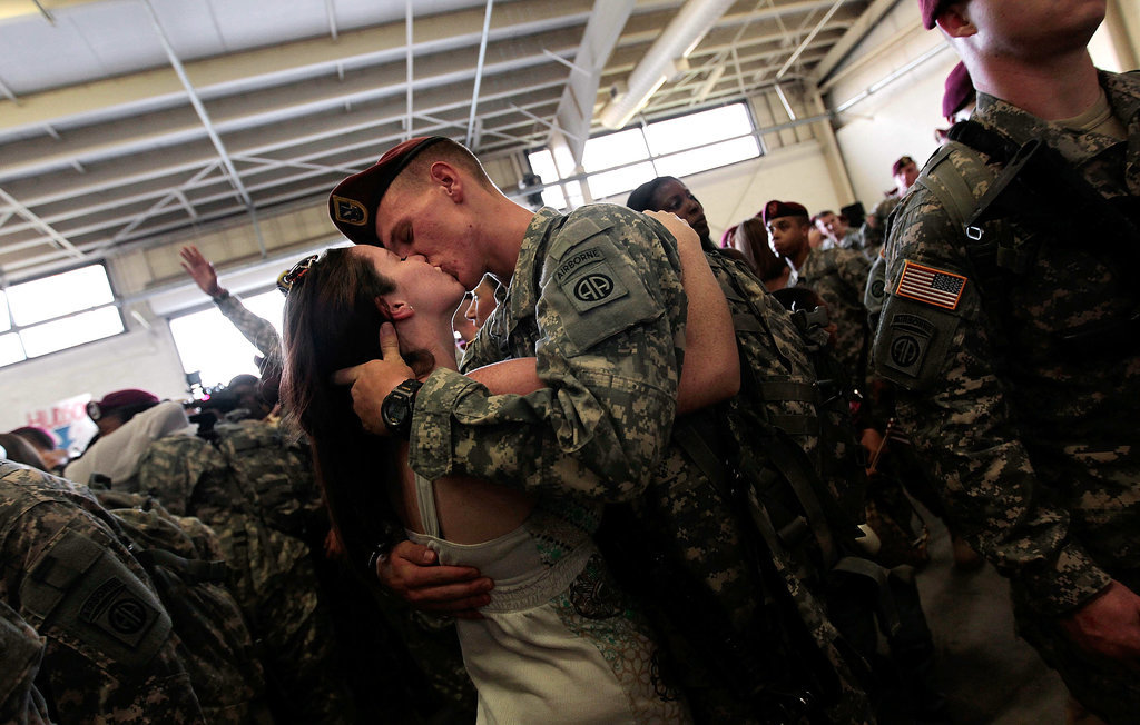 Sgt. Patrick Hopkins embraced his fianceé, Cara Benz, when he returned from a yearlong tour in Iraq with the US Army's 82nd Airborne Division on July 30, 2010, in Fort Bragg, NC.
Sgt. Patrick Hopkins embraced his fianceé, Cara Benz, when he returned from a yearlong tour in Iraq with the US Army's 82nd Airborne Division on July 30, 2010, in Fort Bragg, NC.