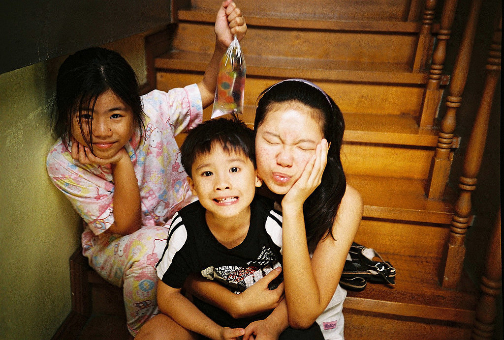 The moment one child smiles is always the same moment another one blinks. The moment one child smiles is always the same moment another one blinks.