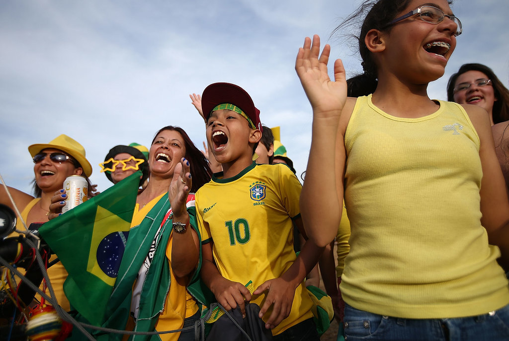 Brazil fans cheered as they stood outside Itaquero Stadium during the World Cup opening ceremony rehearsals. Brazil fans cheered as they stood outside Itaquero Stadium during the World Cup opening ceremony rehearsals.