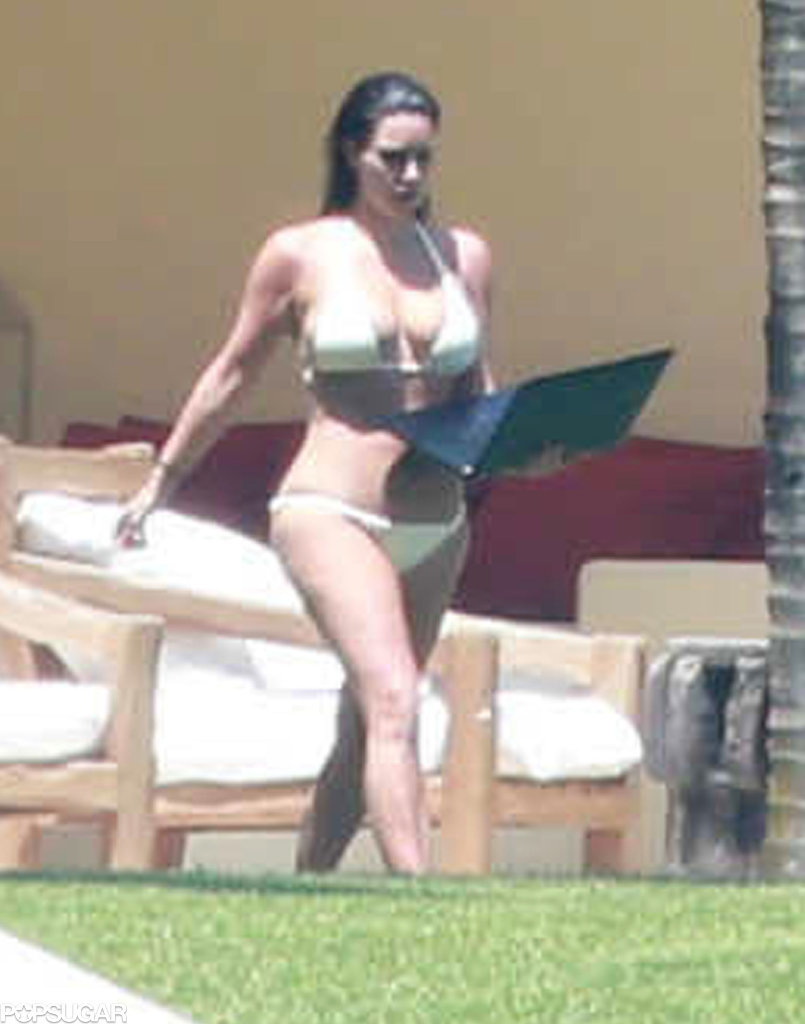 Kim and Kanye Hang Poolside on Their Second Honeymoon!