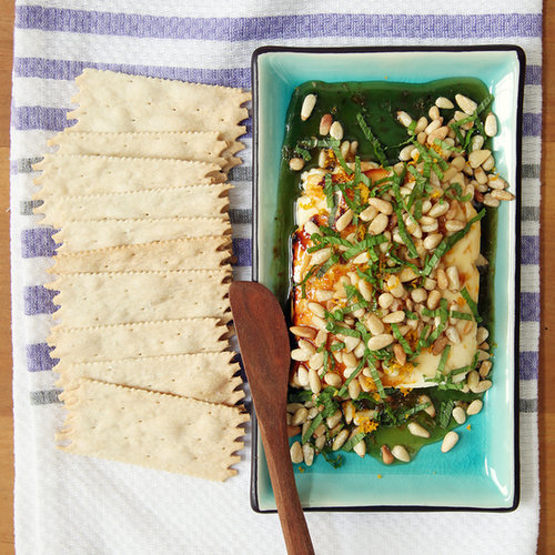 Warm Honey-Drizzled Feta With Pine Nuts, Orange Zest, and Mint Warm Honey-Drizzled Feta With Pine Nuts, Orange Zest, and Mint