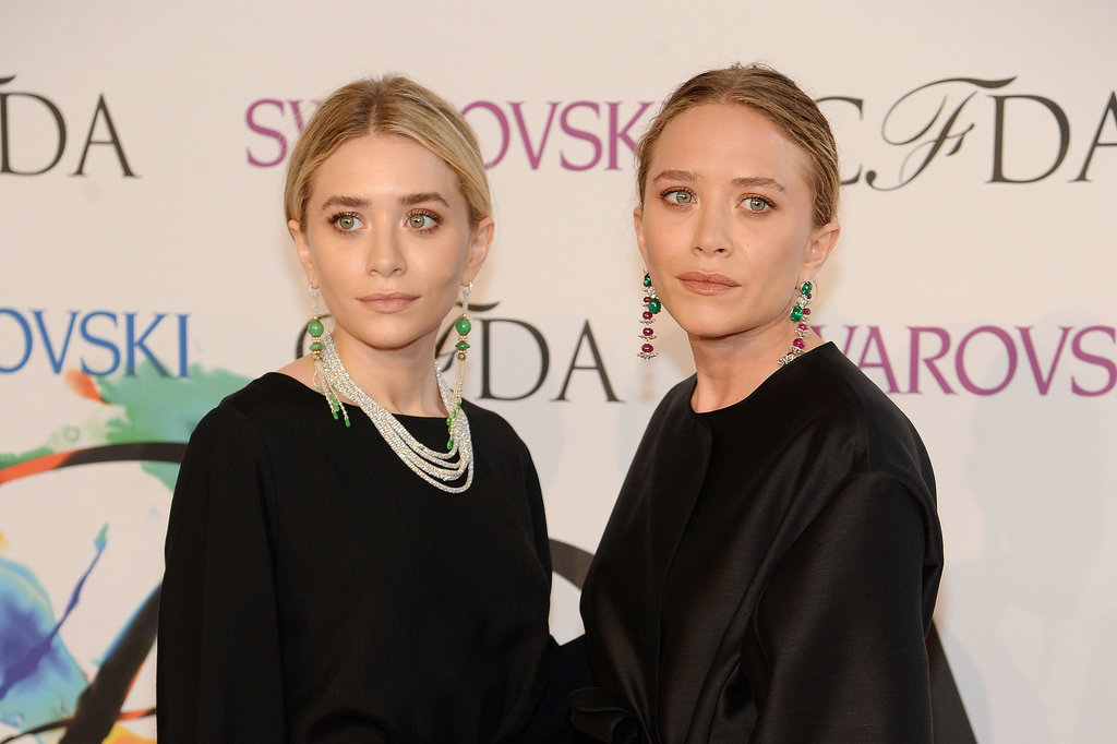 Ashley and Mary-Kate sported matching natural makeup and center-parted hairstyles at the 2014 CFDA Awards.
Ashley and Mary-Kate sported matching natural makeup and center-parted hairstyles at the 2014 CFDA Awards.