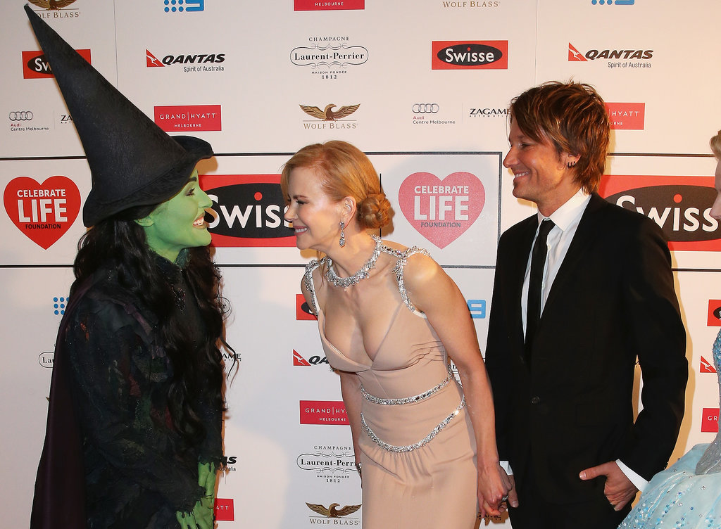 Nicole Kidman and Keith Urban laughed with Jemma Rix, who plays Elphaba in Australia's staging of Wicked, on Friday at the Celebrate Life Ball in Melbourne, Australia.
Nicole Kidman and Keith Urban laughed with Jemma Rix, who plays Elphaba in Australia's staging of Wicked, on Friday at the Celebrate Life Ball in Melbourne, Australia.