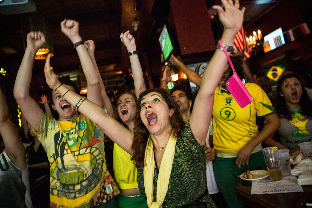 Brazilian soccer fans went wild watching the opening match at a bar in NYC.
Brazilian soccer fans went wild watching the opening match at a bar in NYC.