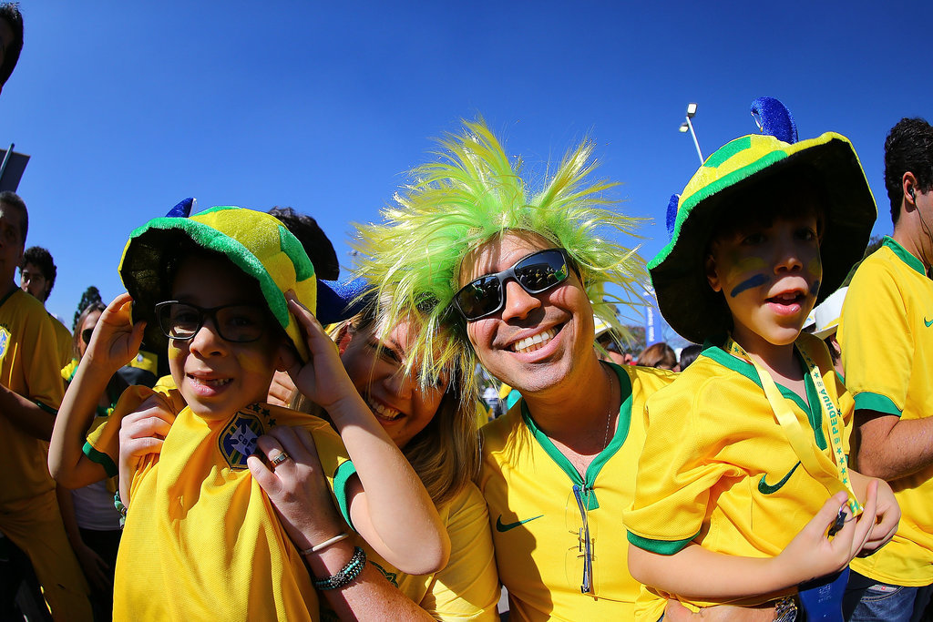 Brazil fans dressed up for the World Cup opening ceremony.
Brazil fans dressed up for the World Cup opening ceremony.