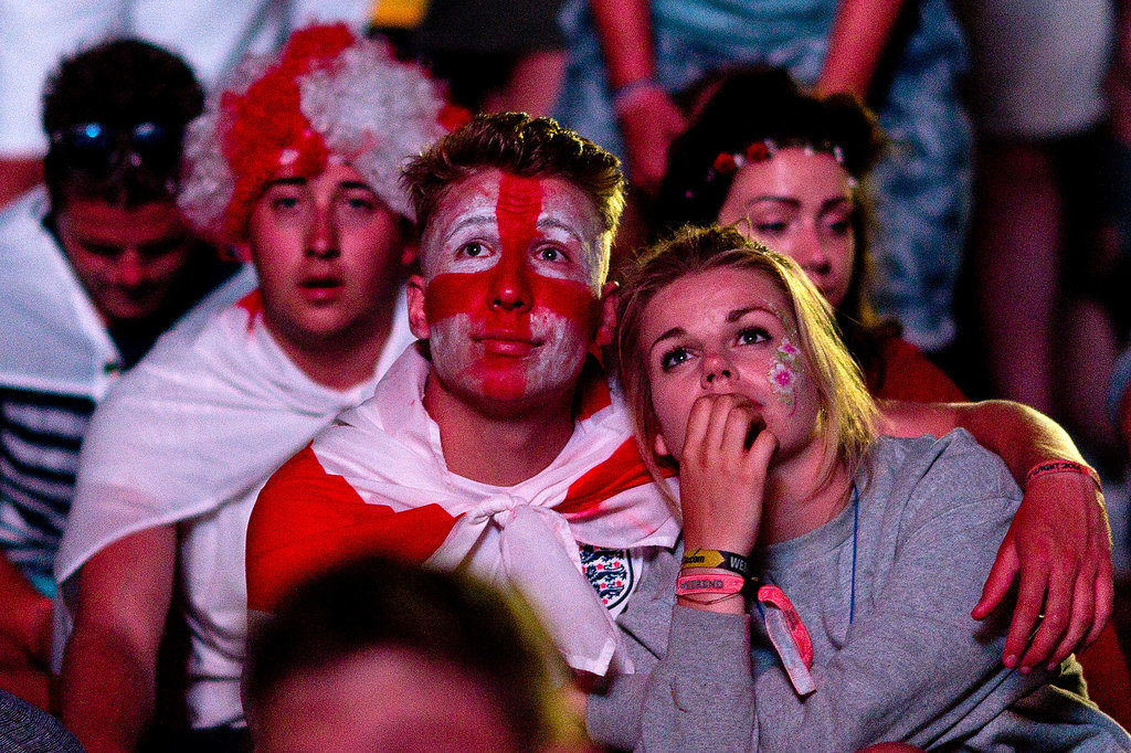 Fans watched the game between England and Italy at a park in Newport, England.
Fans watched the game between England and Italy at a park in Newport, England.