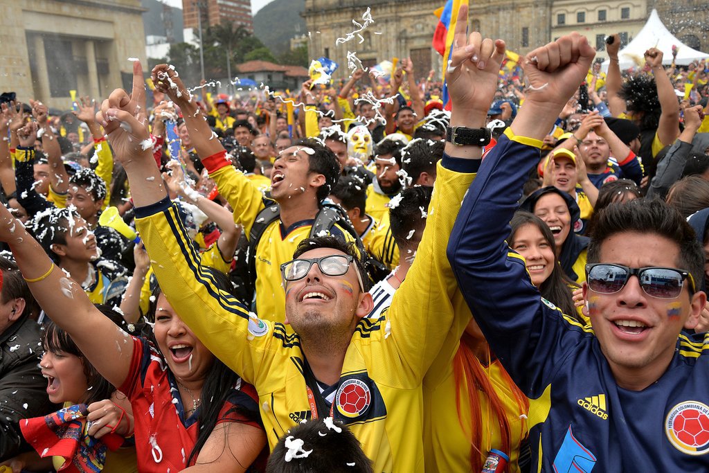 In Bogotá, Colombia, fans celebrated, jumping up and down.
In Bogotá, Colombia, fans celebrated, jumping up and down.